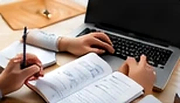 Parent reviewing EHCP paperwork at a laptop